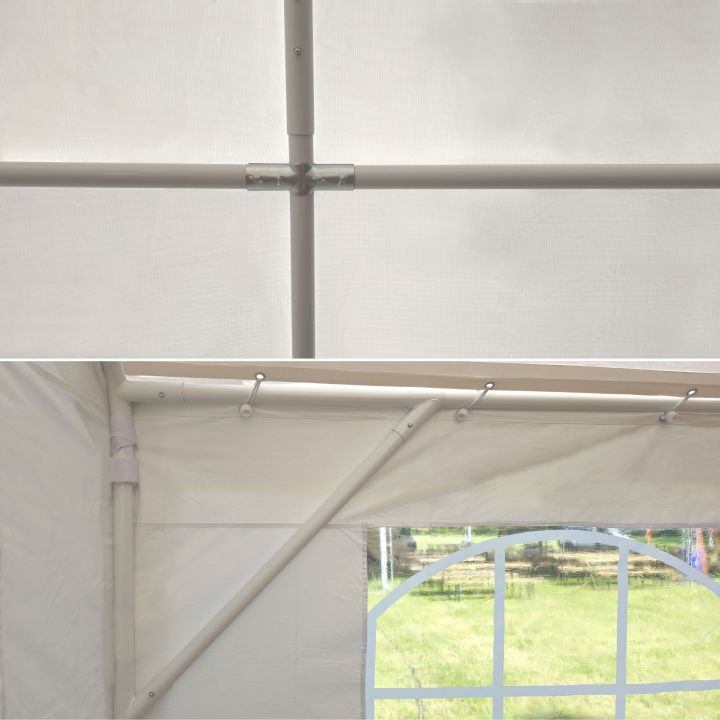 Vitt tält för en trädgårdsfest